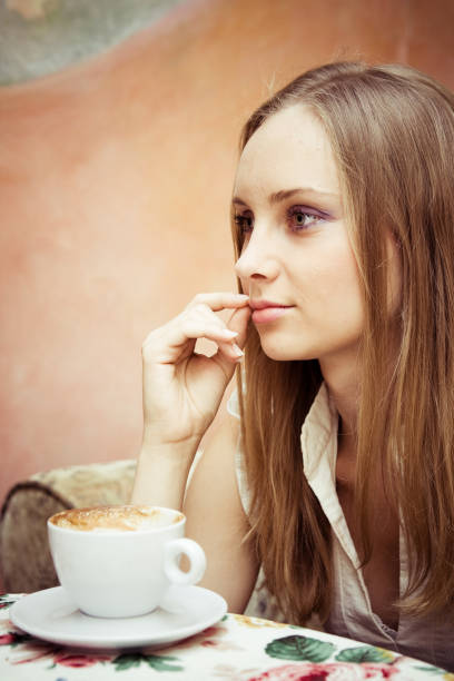istock Woman Sitting with Coffee 108202355