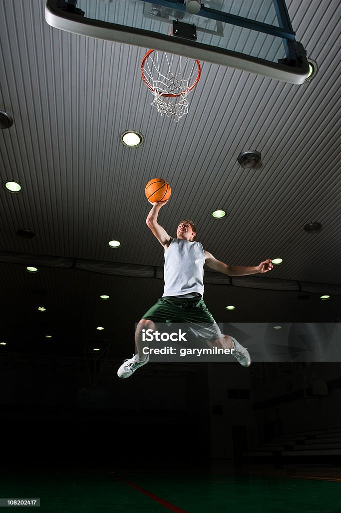 Joven Basketball Player Dunking - Foto de stock de Adulto libre de derechos