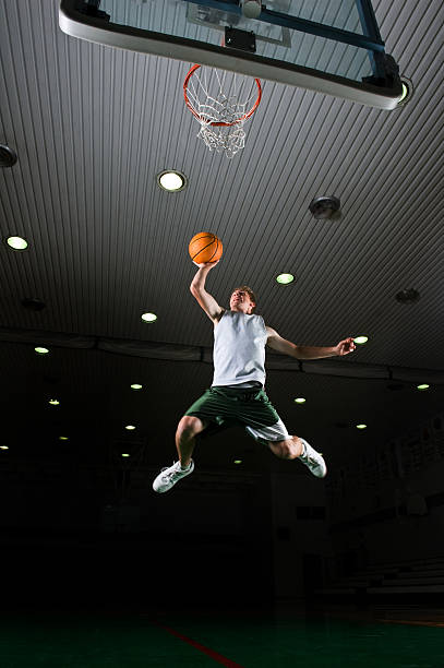 istock Young Man Basketball Player Dunking 108202417