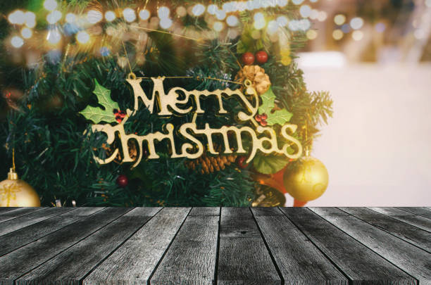 istock empty modern wooden terrace board or table with christmas tree and light in background, copy space for display of product or object presentation, celebration, christmas holiday, festival concept 1082024304