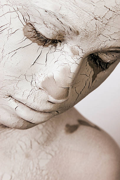 istock Young Woman Wearing Dried Clay Mask 108202471