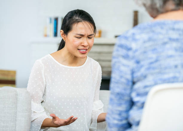 istock Sad woman at therapy 1082024798