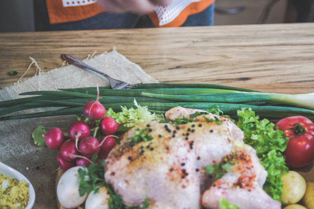 Man preparing chicken