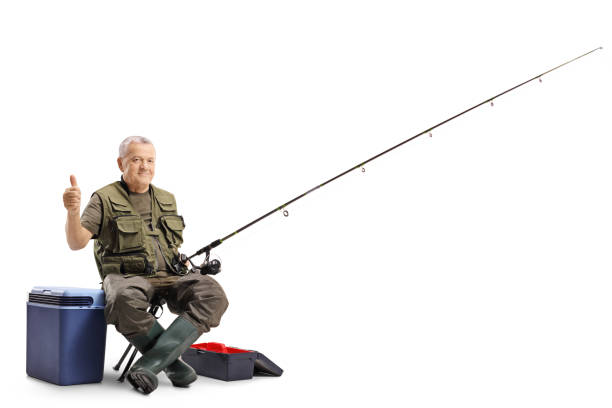 istock Elderly fisherman holding his thumb up 1082025542