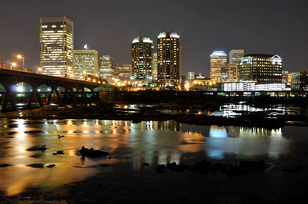 istock Richmond, Virginia City Skyline Along Water at Night 108202576