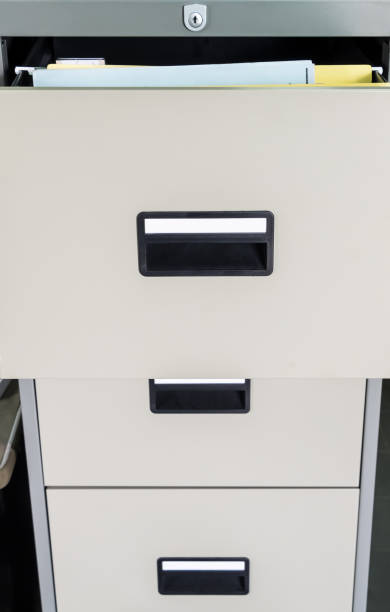 istock Metal file cabinet with open drawer. 1082028030
