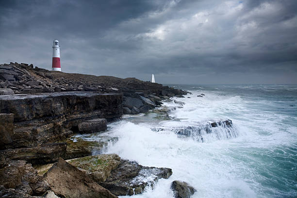 istock Stormy Sea and Sky on Rocky Coastline with Lighthouse 108202844