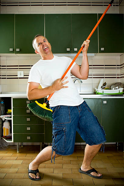 Broom Guitar  air guitar stock pictures, royalty-free photos & images