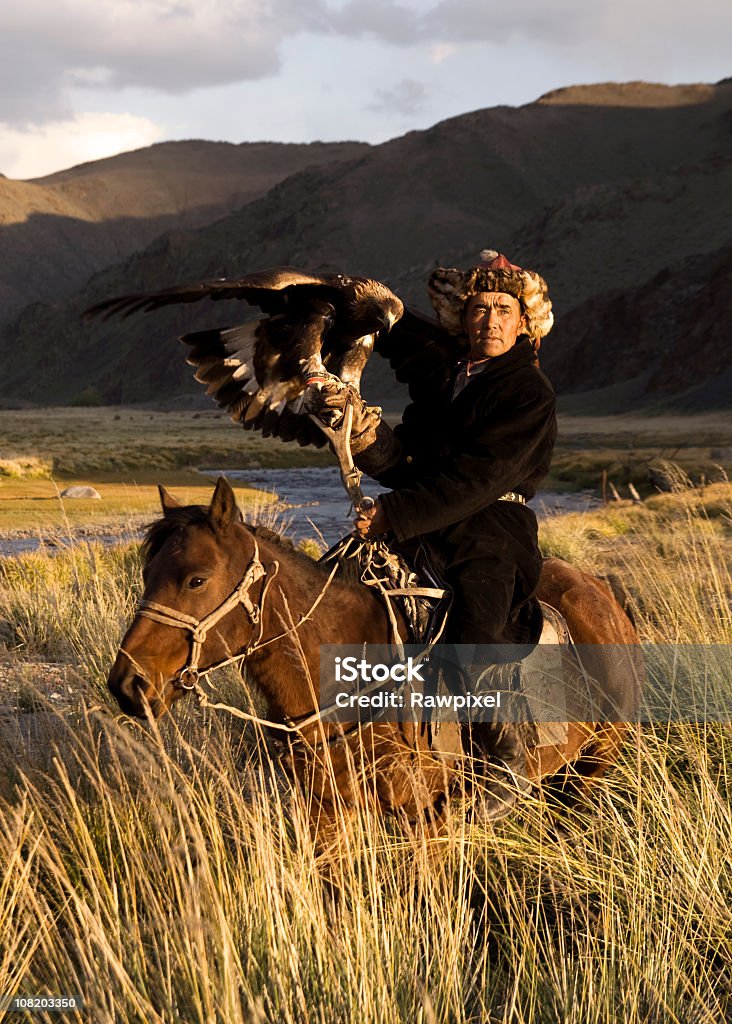 Mongolian Man with Trained Eagle  Independent Mongolia Stock Photo