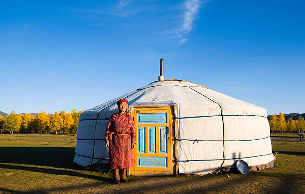 istock Nomadic Mongolian Woman in Front of Yurt 108203351