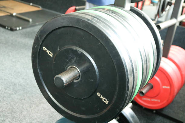 istock Weights in the gym for training on their stand 1082034188