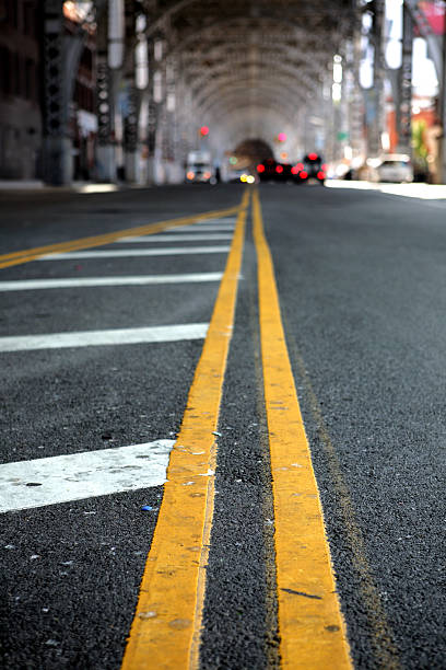 istock Double Yellow Line Under Riverside Overpass in New York 108203573