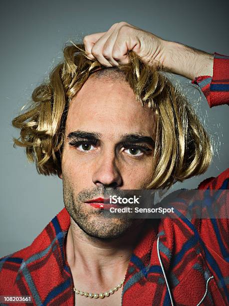 Cross Dressed Man Putting On Wig Stock Photo - Download Image Now - Humor, Headshot, Actor