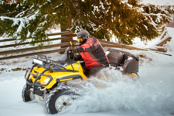 istock Winter race on an ATV on snow in the forest. 1082036634