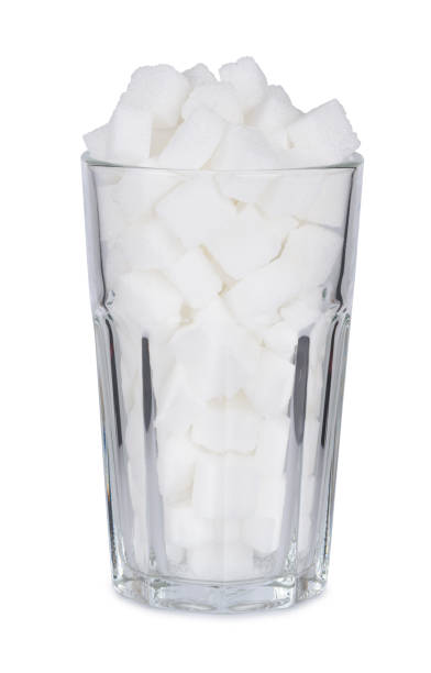 istock Glass full of lump sugar 1082040918