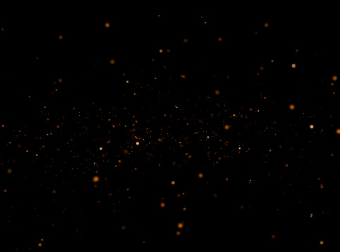 Golden sparkles at night background