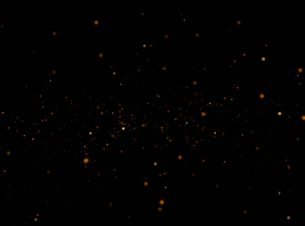 Golden sparkles at night stock photo