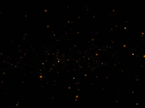 Golden sparkles at night background