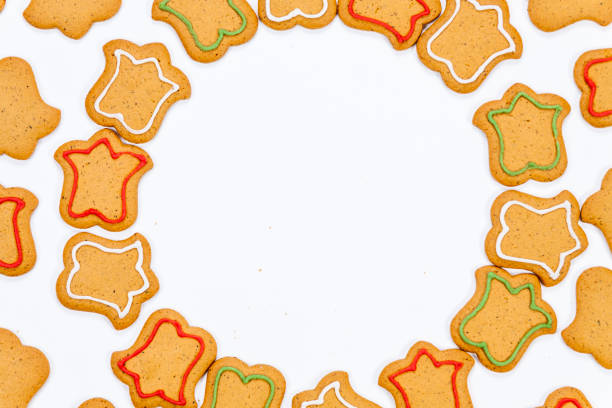 istock Gingerbread cookies with colorful icing isolated on white background 1082064696