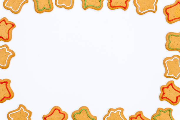 istock Gingerbread cookies with colorful icing isolated on white surface 1082064698