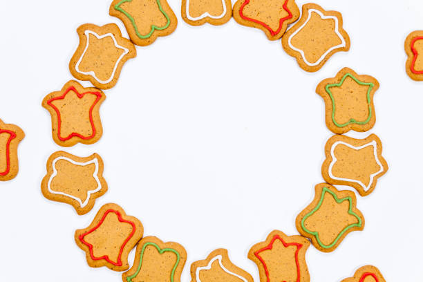 istock Gingerbread cookies with colorful icing isolated on white background 1082064706