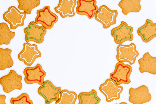 istock Gingerbread cookies with colorful icing isolated on white background 1082064762