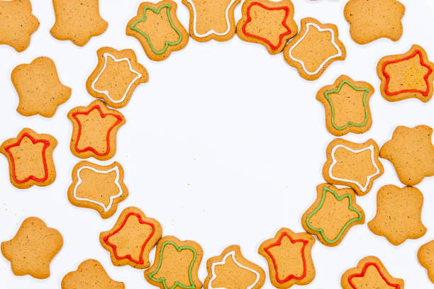 istock Gingerbread cookies with colorful icing isolated on white background 1082064764