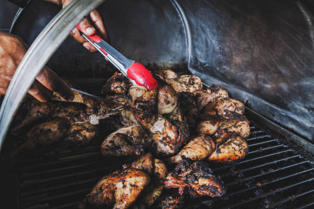 Spicy Grilled Jerk Chicken on the barbecue stock photo