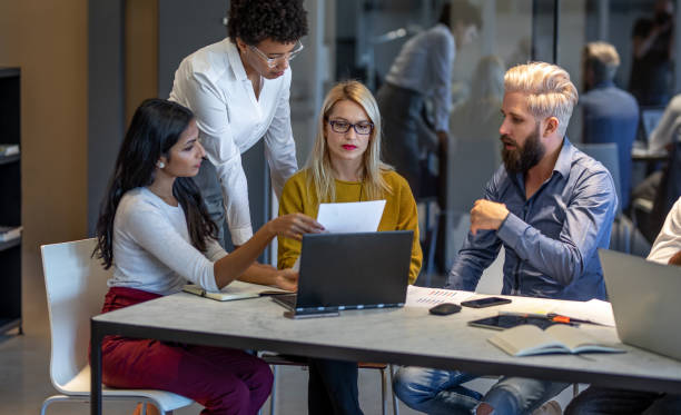 istock Young Business People Having a Meeting 1082072198