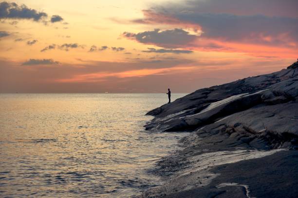 istock Evening fishing at sunset. 1082081728