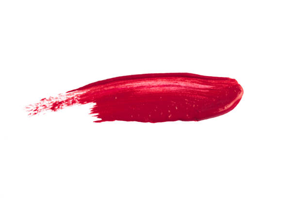 istock Smudged red lipstick isolated on white background 1082084436