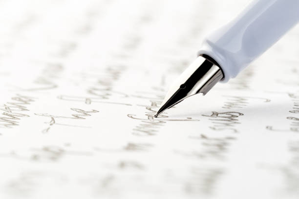istock white fountain pen writing a letter 1082084654