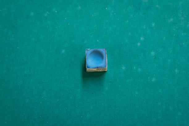 A snooker chalk A snooker chalk on a pool table. sports chalk stock pictures, royalty-free photos & images