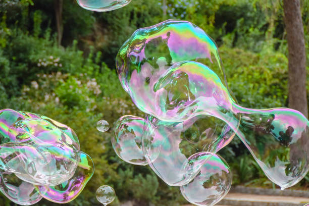 istock huge lots of soap bubbles multicolored bright reflections water summer bokeh 1082093144