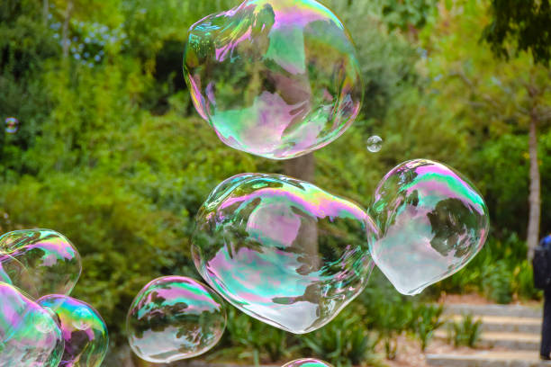 istock huge lots of soap bubbles multicolored bright reflections water summer bokeh 1082093244