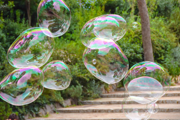 istock huge lots of soap bubbles multicolored bright reflections water summer bokeh 1082093294