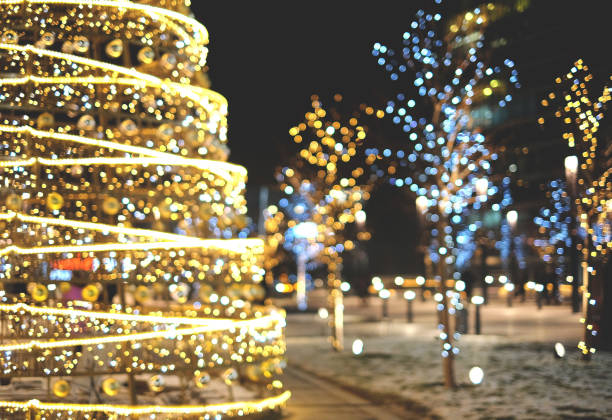 istock Christmas decoration background with golden and blue lights glowing 1082095656