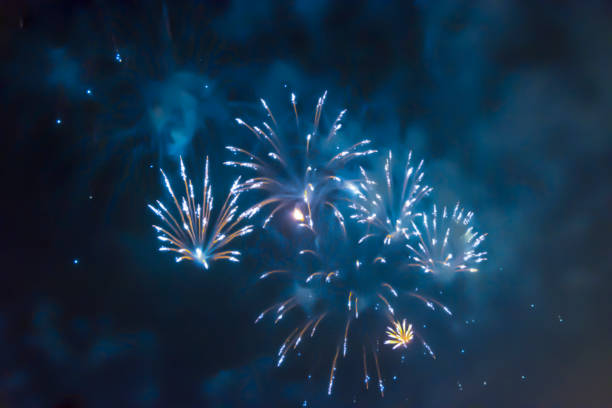 istock blue bright blurred fireworks effect abstract colorful background holiday 1082098104
