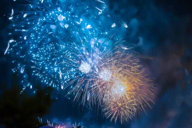 istock blue bright blurred fireworks effect abstract colorful background holiday 1082098200