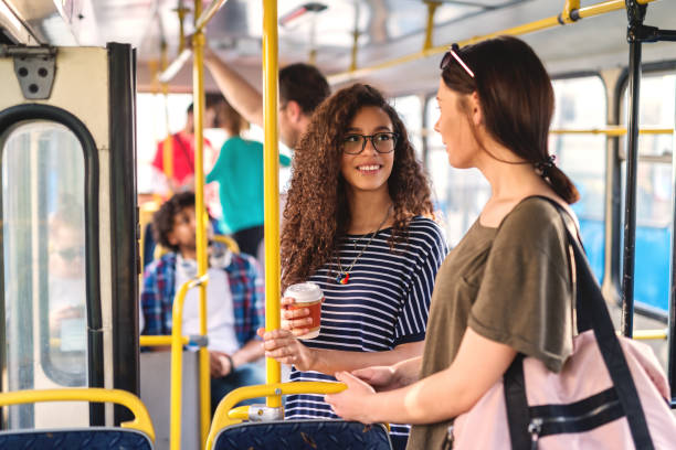 8,000+ Two People In Bus Stock Photos, Pictures & Royalty-Free Images - iStock | Two people sitting on bench, Two people sharing chocolate, Tired people in bus