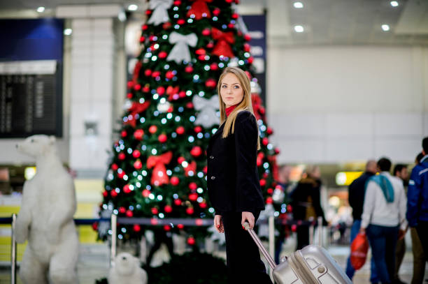 istock Woman with suitcase is going to board on the next flight 1082106440