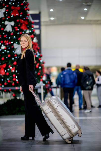 istock Woman with suitcase is going to board on the next flight 1082106494
