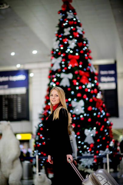 istock Woman with suitcase is going to board on the next flight 1082106516
