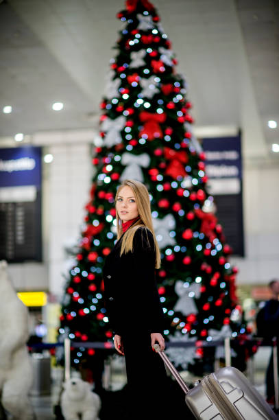 istock Woman with suitcase is going to board on the next flight 1082106546