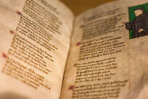 The Canterbury Tales manuscript in the British Library London UK Manuscript of The Canterbury Tales by Geoffrey Chaucer from c. 1410, located in the British Library, the national library of the United Kingdom in London, UK. anglo saxon photos stock pictures, royalty-free photos & images