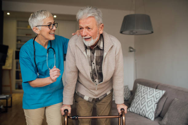 istock Happy nurse assisting patient when walking 1082121082