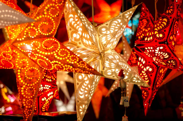 istock LED light christmas paper star decorations. 1082121296