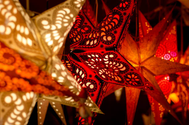 istock LED light christmas paper star decorations. 1082121758