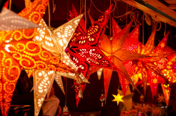 istock LED light christmas paper star decorations. 1082126218