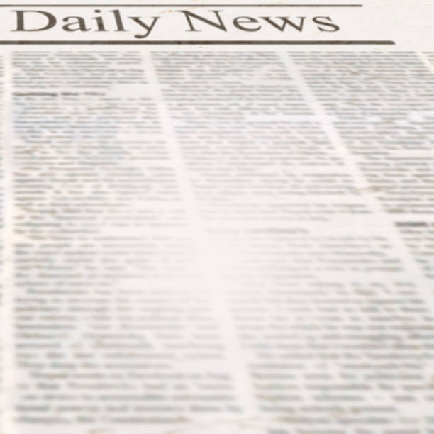 istock Daily news newspaper with headline and old unreadable text 1082138256